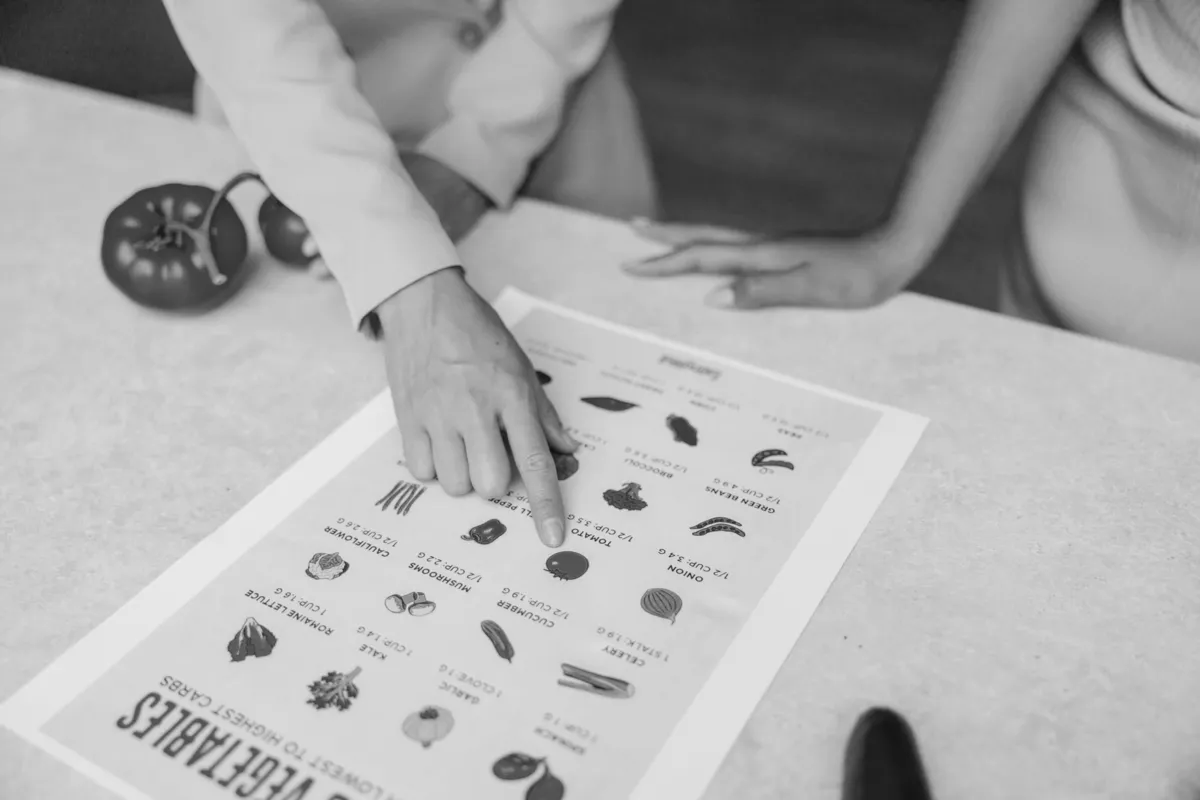 Healthcare professional reviewing nutrition and diet plan with patient